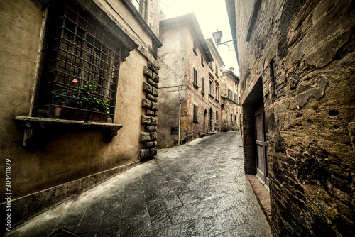 Narrow alley in a small village in Tuscany