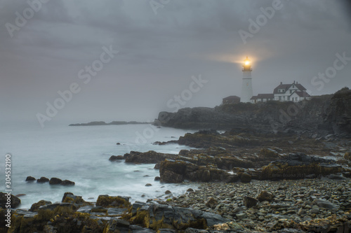 lighthouse in heavy fog