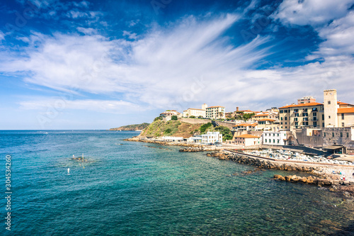 Picturesque view on Piombino town and beach from piazza Bovio, Tuscany