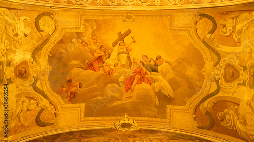 ACIREALE, ITALY - APRIL 10, 2018: The symbolic fresco of Faith cardinal virtue among the angels in Basilica Collegiata di San Sebastiano by Francesco Mancini Ardizzone (1899 - 1901).