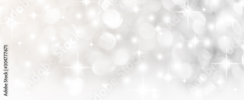 abstract blur white and silver color panoramic background with star glittering light for show,promote and advertisee product and content in merry christmas and happy new year season collection concept