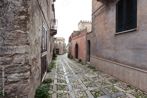 Narrow stone street of Erice medieval town, Sicily, Italy