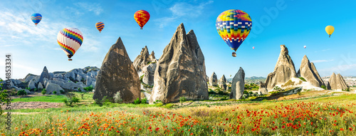 Travel concept. The great tourist attraction of Cappadocia - balloon flight. Cappadocia is known around the world as one of the best places to fly with hot air balloons. Goreme, Cappadocia, Turkey. Ar