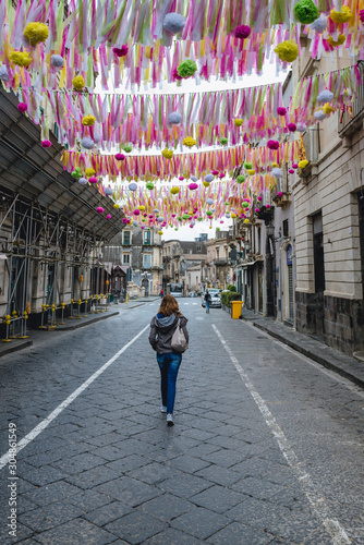Paper flowers on Vittorio Emanuele II Street in Acireale city on Sicily Island, Italy