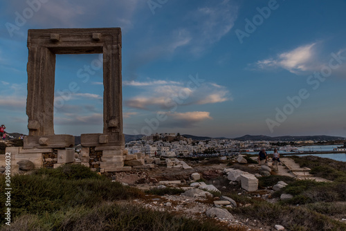 Portara - ruins of ancient temple of Delian Apollo on Naxos island at sunset, Cyclades archipelago, Greece.