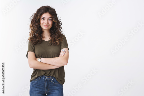 Sassy attractive confident freelance armenian girl with curly hair standing self-assured arms crossed chest grinning determined accomplish any goal, ready solve your problem, white background