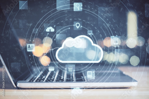 Laptop with cloud computing diagram