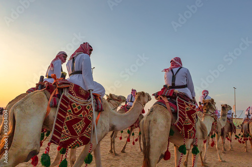 Desert safari camel ride festival in Abqaiq Dammam Saudi Arabia.