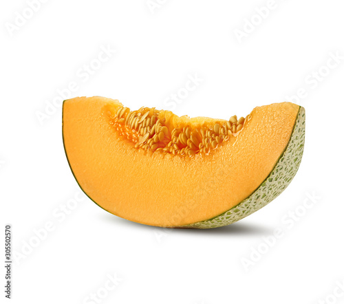 Slice of delicious cantaloupe melon in a cross-section, isolated on white background with copy space for text or images. Side view. Close-up shot.