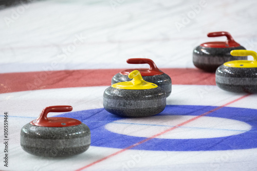 Curling rock on the ice