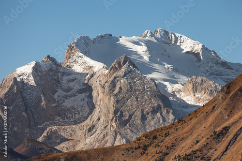 Marmolada mount is the highest peak in the Italian Dolomites with its characteristic perennial glacier on the northern face