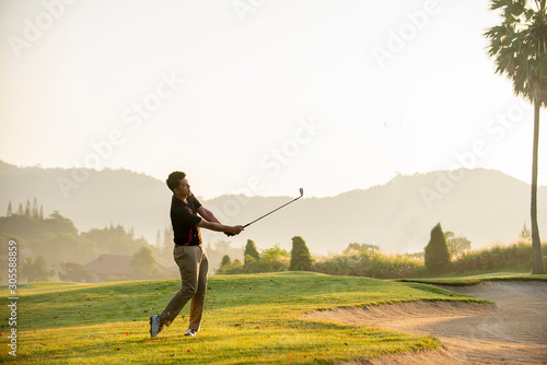 golfer playing golf at golf course