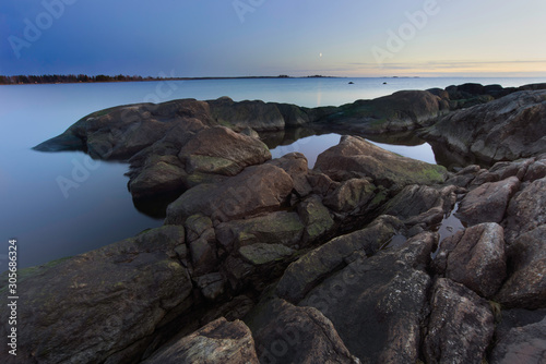 Sunset on rocky shore of the Baltic Sea