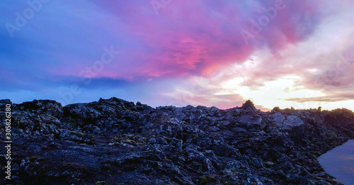 sunrise over a lava field