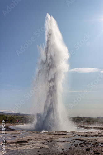 old faithful geyser eruption in yellowstone national park, Big strokkur geyser in action vertical photo