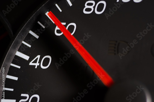 Close-up of the car speed meter. Car speedometer close up, speed 60