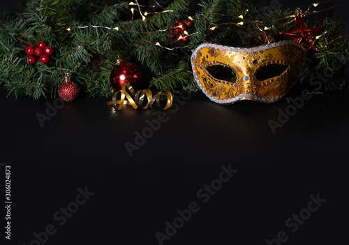 New year and Christmas background, masquerade mask ready for party invitation, traditional celebration