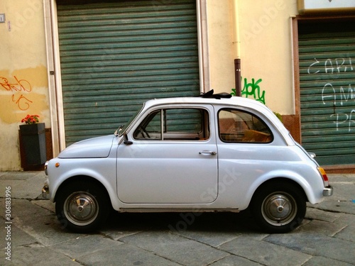 old fiat 500 in front of house