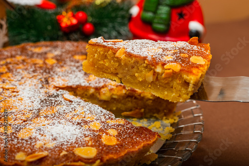 Swedish Almond pie tart with christmas themed background