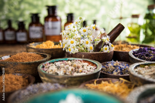 Natural remedy,Herbal medicine and wooden table background