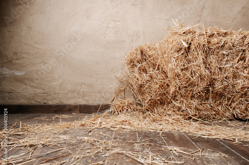 Wooden floor background and dry straw
