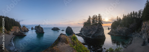Panorama of Secret Beach in Oregon during a sunset