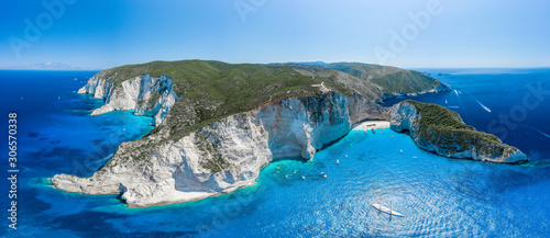 Aerial panorama drone shot of Zakynthos north end with Navagio beach and yachts in Ionian sea