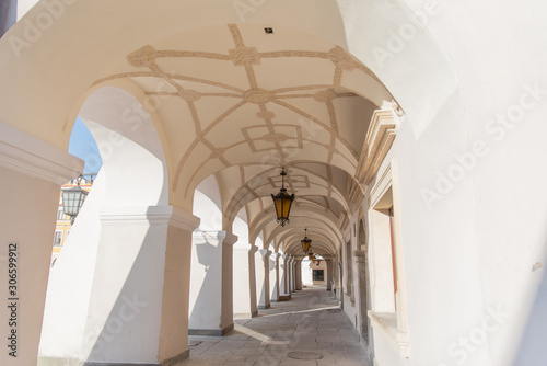 Old renaissance or mannerist arcades of tenement house in Zamosc Poland, example of Lublin renaissance, renesans lubelski, ceiling covered with stucco mannerist ornaments