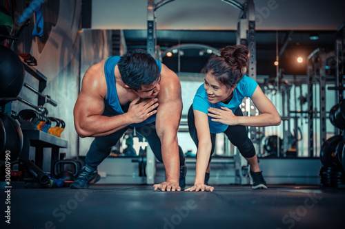Teen couples exercise in the gym