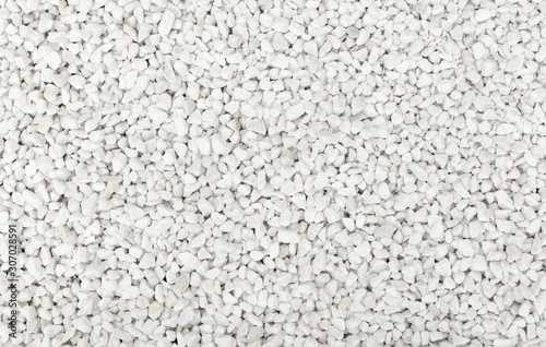 Seamless plain white gravel texture background from above.