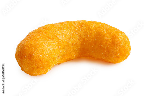 Single extruded cheese puff isolated on white.