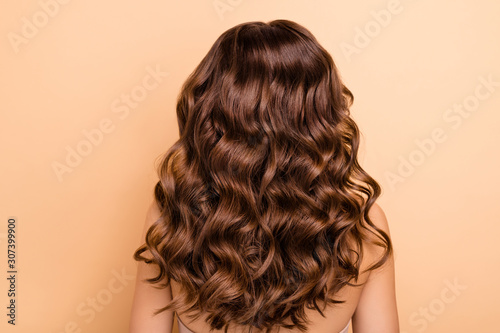 Back rear side photo of charming girl show perfect strong wellness hairstyle hairdo after hairdresser therapy coiffure have professional hair coloration isolated over pastel color background