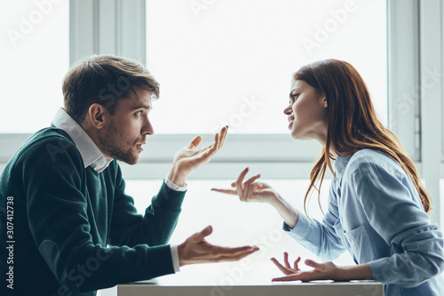 man and woman shaking hands