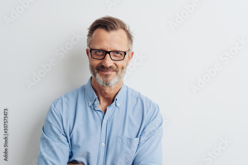 Bearded middle-aged man wearing glasses