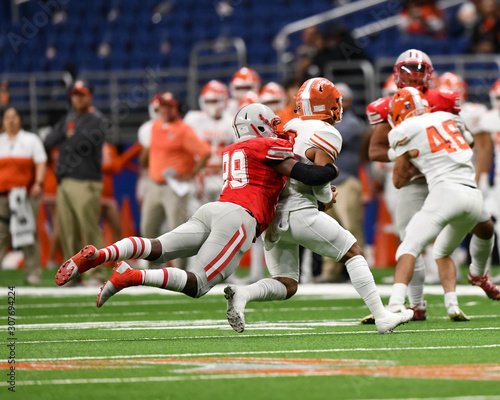 Great action photos of high school football players making amazing plays during a football game