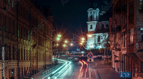 Lviv at night, ukrainian city long exposure photo, road, transport lights, lviv old city in the evening