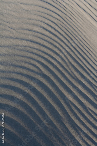 Sand waves on a beach.