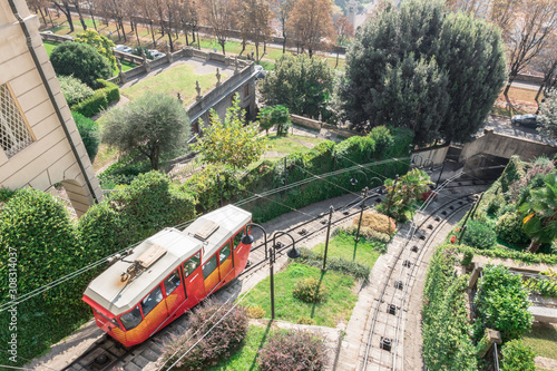 Red funicular in the old city of Bergamo