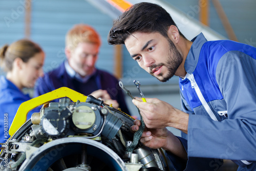 aviation mechanical parts assembler doing his work