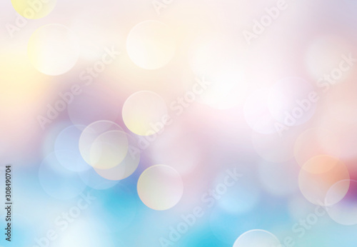 Blue yellow winter spring colorful gradien bokeh glowing background.