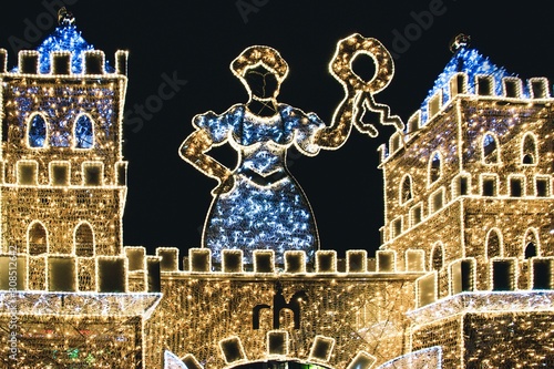Illuminated castle with Christmas decorations on black background in Magdeburg, Germany