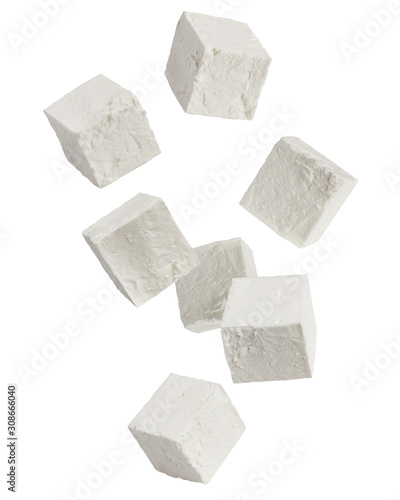 Falling Feta, Greek cheese cubes, isolated on white background, clipping path, full depth of field