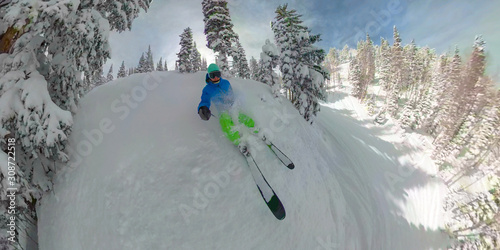 SELFIE: Man skiing through a wintry forest in the backcountry of Deer Valley.