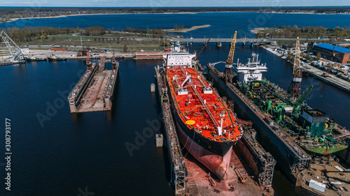 Tanker vessel repair in dry dock Shipyard, Drone shot