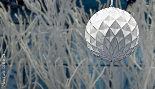 White Christmas Ball stock images. White Christmas background with copy space for text. Festive light background. Xmas decorations ball