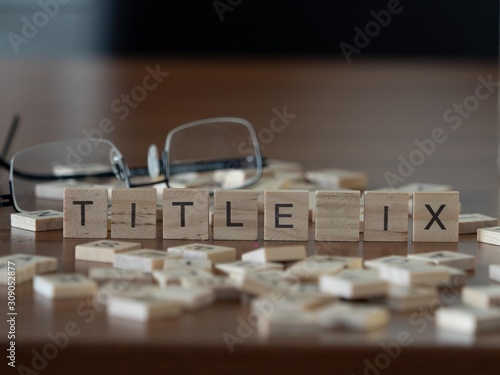 title ix the word or concept represented by wooden letter tiles