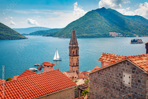 Not far from the famous city of Kotor is a small town of Perast. Splendid morning scene of Kotor Bay, Montenegro, Europe. Traveling concept background. Beautiful world of Mediterranean countries.