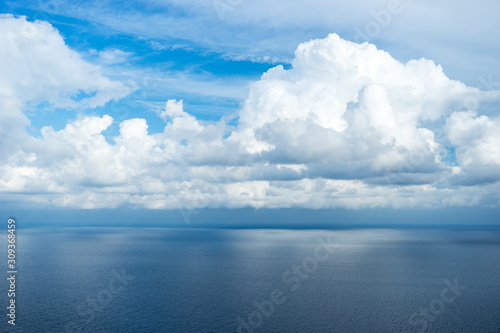 Horizon between sky and sea on a cloudy and calm day