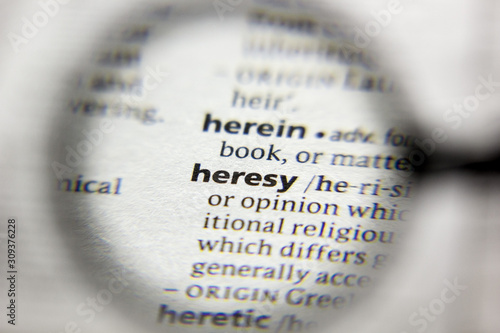 The word or phrase Heresy in a dictionary.
