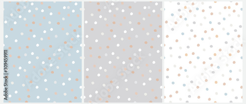 Simple Hand Drawn Irregular Dots Vector Patterns. Blue, Brown, White and Beige Dots on a Gray, Blue and White Background. Infantile Style Abstract Dotted Vector Print Ideal for Fabric, Textile, Cover.